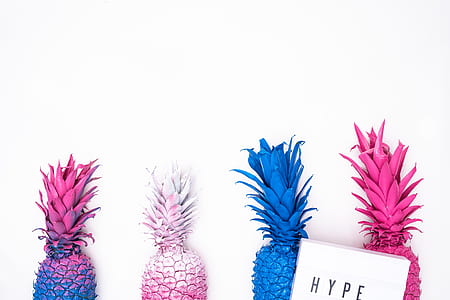 four assorted-color pineapples decors thumbnail