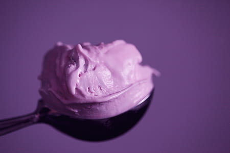 strawberry ice cream on black spoon thumbnail