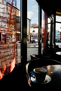 Cup of coffee in a cafe thumbnail