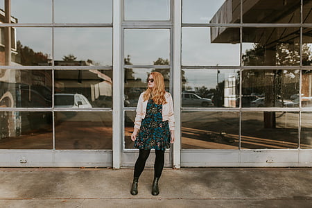woman standing near building thumbnail