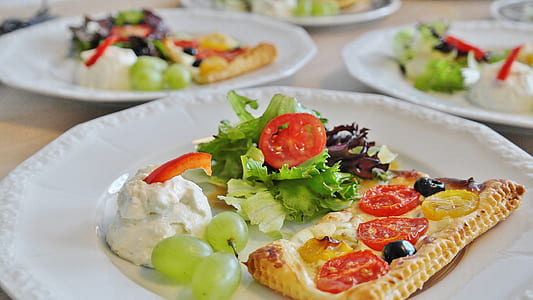 baked bread with vegetables on plate thumbnail