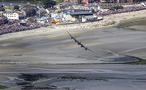 gray aircraft hovering above body of water thumbnail