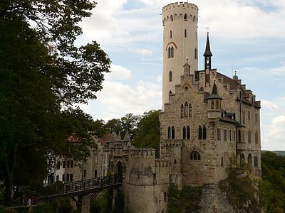 beige stone castle under white clouds thumbnail