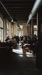 people sitting on chairs inside room thumbnail