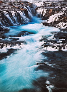 waterfalls during daytime thumbnail