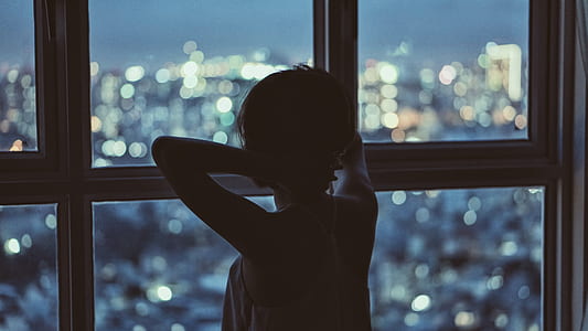 photo woman near window fence thumbnail