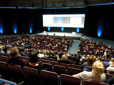 group of people listening on convention thumbnail