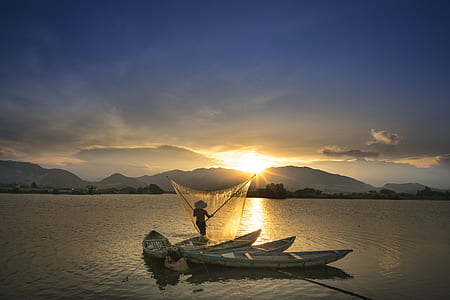 three white boat on body of water during thumbnail