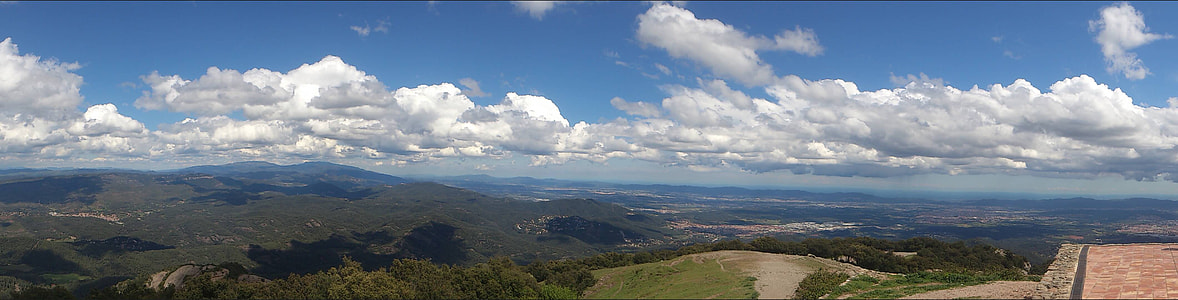 white clouds on top of green meadows during daytime thumbnail