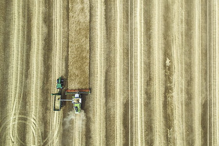brown and black farm tractor thumbnail