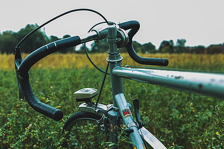 shallow focus photography of grey road bicycle thumbnail