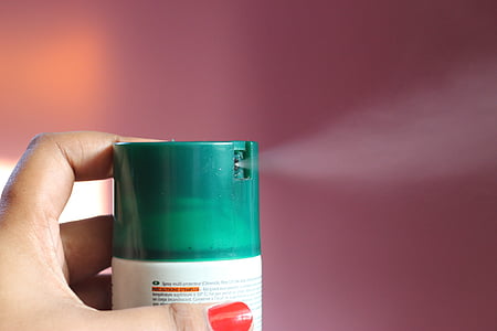 person spraying thumbnail