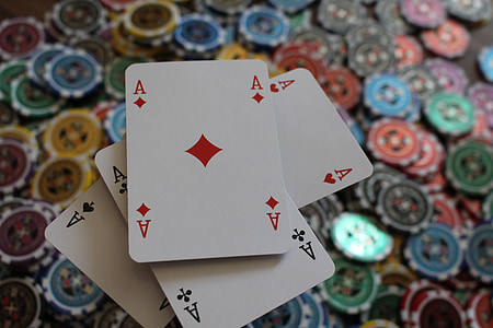 Quads of Ace with poker chips background thumbnail