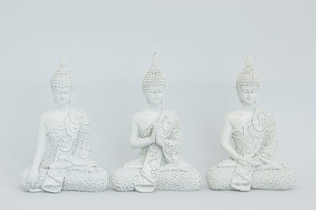 three Gautama buddha ceramic figurines thumbnail