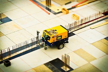 selective focus photography of yellow utility trailer toy thumbnail
