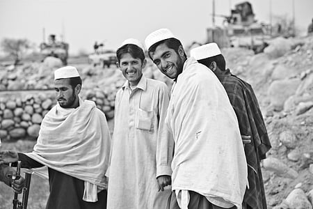 grayscale photo of four men thumbnail