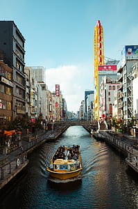 group of people riding boat during daytime thumbnail