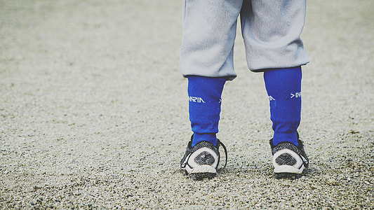 person wearing blue socks and black-and-white shoes thumbnail