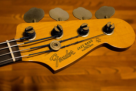 brown Fender Jazz Bass guitar headstock thumbnail