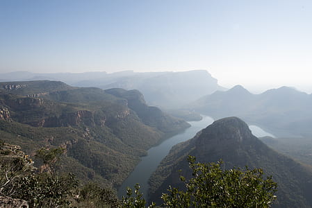 landscape photo of lake near by mountain terrain thumbnail