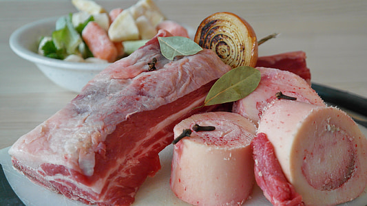 raw meats on ceramic plate in macro photography thumbnail