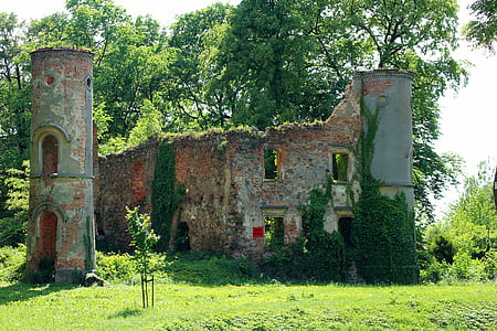 photo of gray concrete tower covered with grass thumbnail