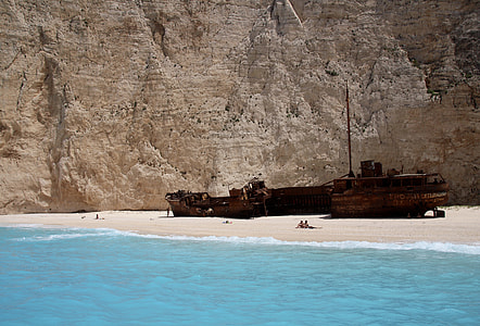wreck boat on seashore thumbnail