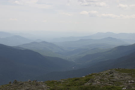 green mountain during daytime thumbnail