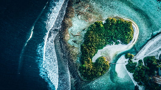 bird's eye view of islet and waves thumbnail