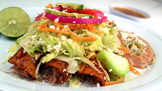 sliced vegetables on white ceramic plate thumbnail