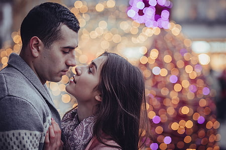 man and woman facing each other thumbnail