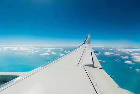 white airplane wing at daytime thumbnail