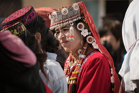 woman in red traditional dress thumbnail