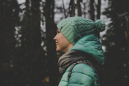 selective focus of woman smiling during daytime thumbnail