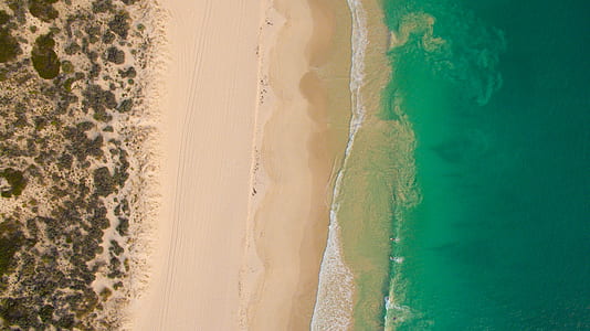 top view of beach during daytime thumbnail