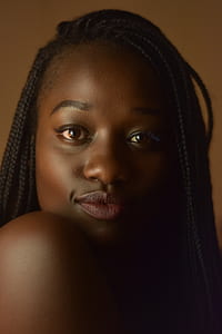 woman with black hair in dreadlocks thumbnail