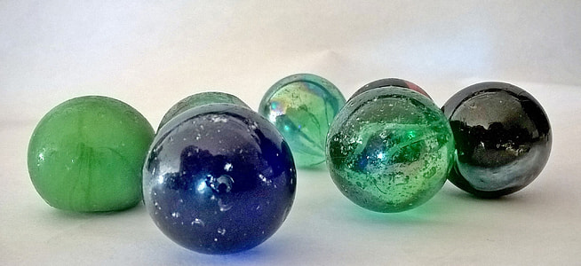 seven assorted color marble toys thumbnail