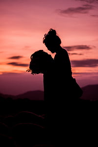 silhouette of couple during golden hour thumbnail