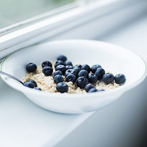 blueberries in white bowl beside window thumbnail