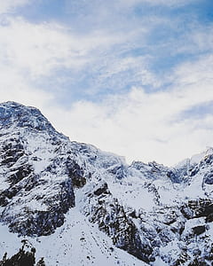 snowy mountain during cloudy day thumbnail