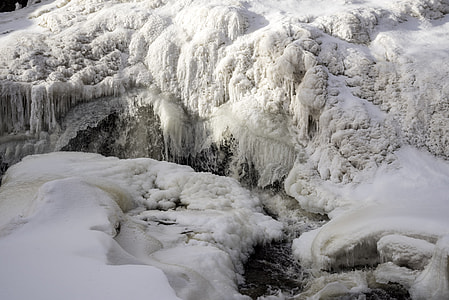 Water cascading at the frozen falls at Gooseberry Falls State Park, Minnesota thumbnail