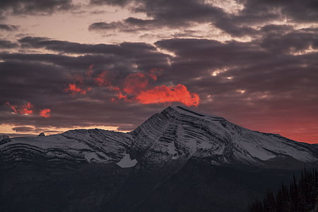 snow-covered mountain during sunset thumbnail