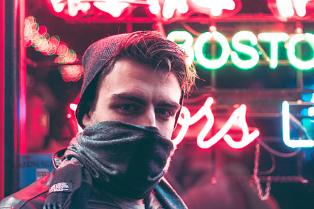 man wearing gray and black scarf thumbnail
