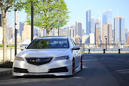 white Acura TSX on road thumbnail