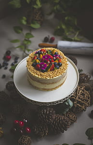 plate of sans rival cake with fruits on top thumbnail