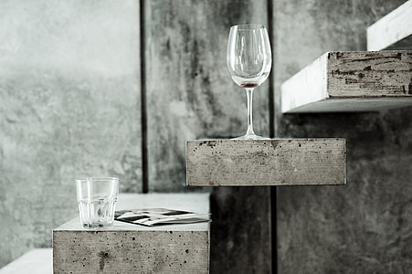 shot glass and wine glass on top wooden stairs thumbnail