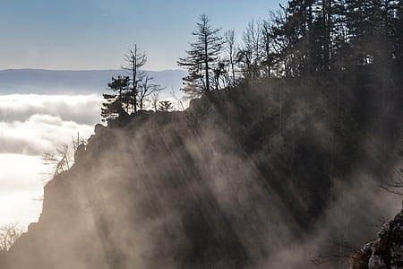 aerial photo of cliff under fogs thumbnail