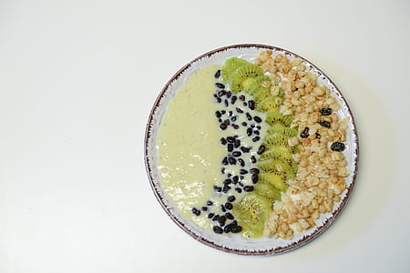 Slice Kiwifruit and Nuts on Plate thumbnail