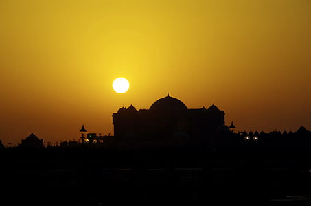 silhouette mosque under sun thumbnail