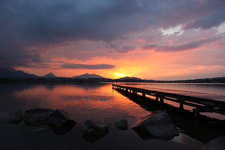beach dock during golden hour thumbnail